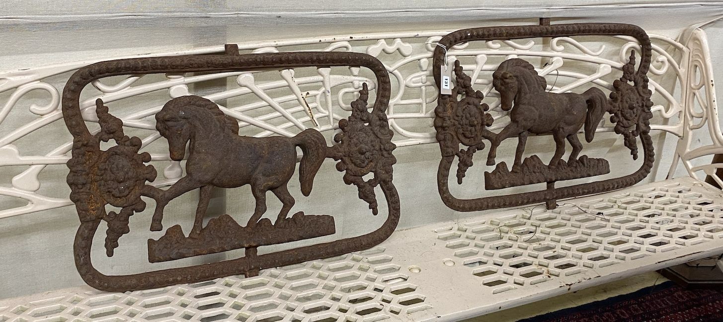 A pair of Victorian style cast iron horse plaques, width 72cm, height 52cm